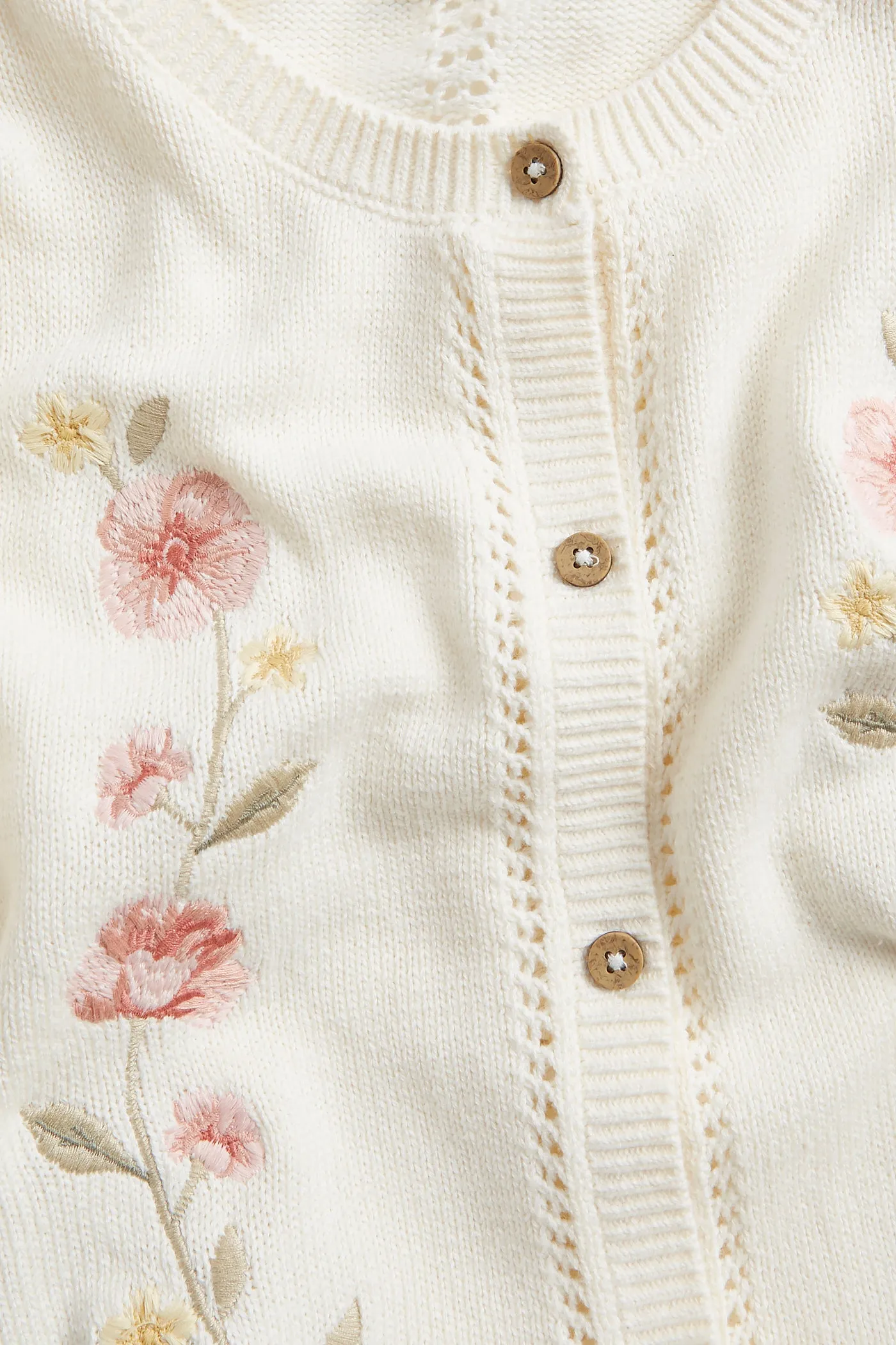 Women's white cardigan with floral embroidery